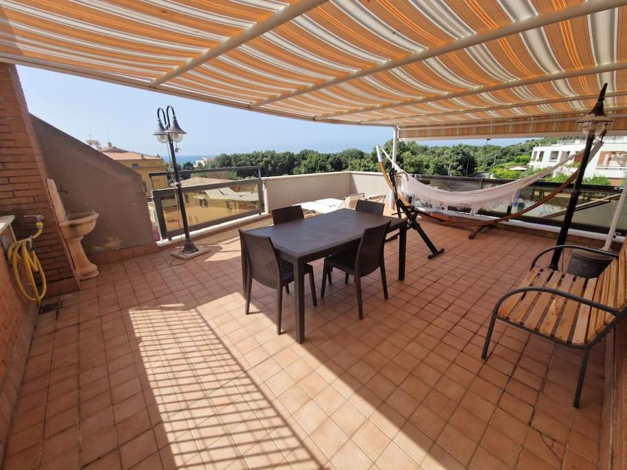 Terrazza A Nettuno E Chiesa Giubilare Santa Maria Goretti Экстерьер фото